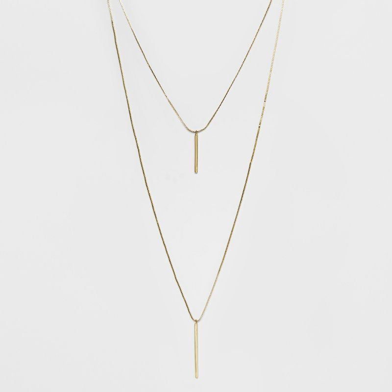 Short and Long Layered Pendant Necklace - A New Day™ Gold: Multi-Strand, Lobster Claw Clasp, 36" Length, Steel, Brass, Zinc